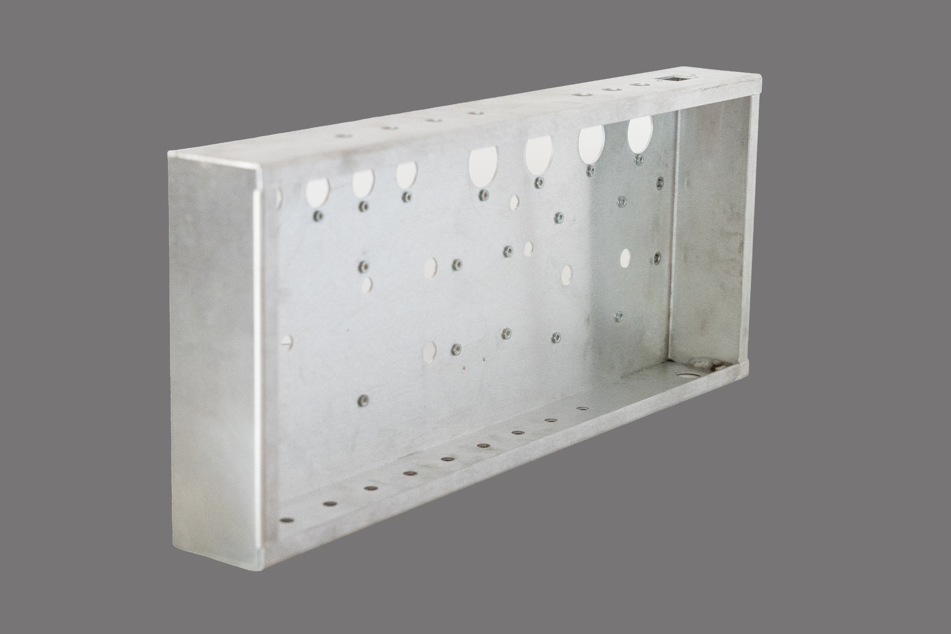 Precision aluminum enclosure with hardware insertion