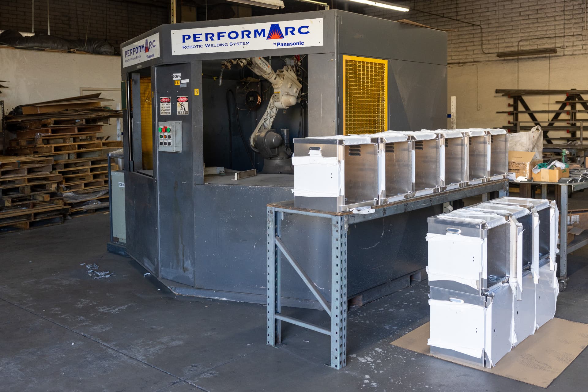 PerformArc robotic welding cell at SureTrak with finished enclosures